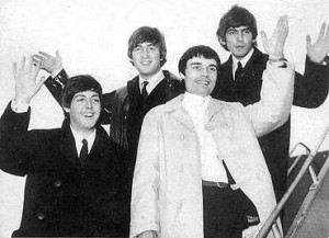 The Beatles with Jimmie Nicol (center) arrive in Sydney in June 1964.